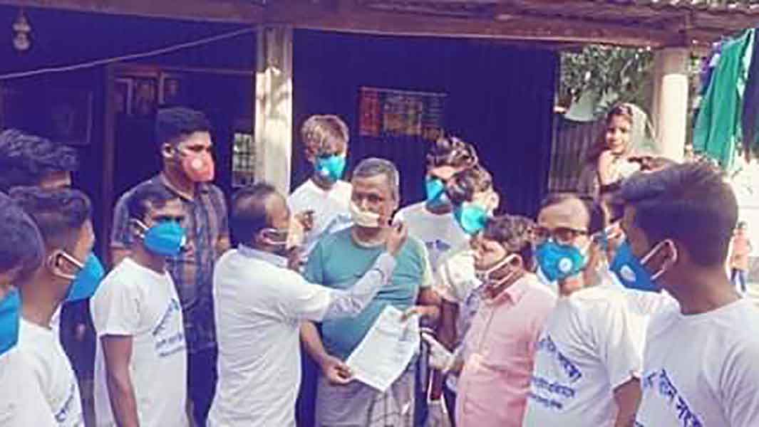করোনা প্রতিরোধে গঙ্গানগর উন্নয়ন সংস্থা ও আলো ফাউন্ডেশন এর লিফলেট মাস্ক বিতরণ